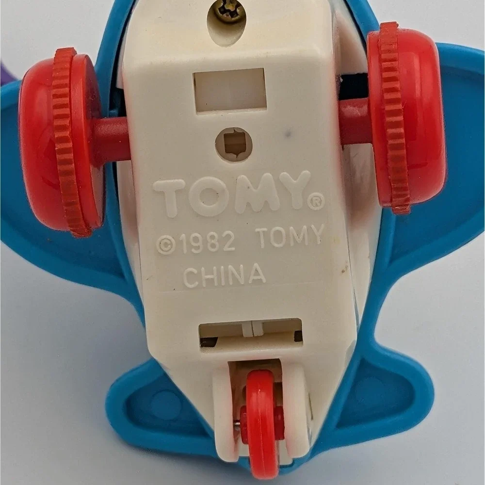 VTG 1982 Tomy Airplane Keychain Push and Go Plastic Propeller Plane Bag Charm